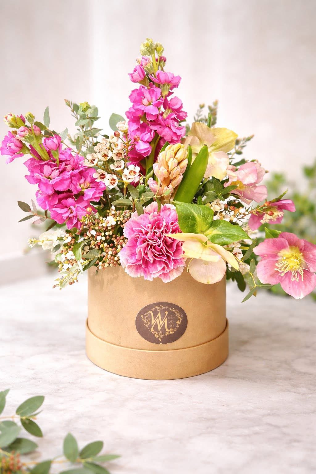 Seasonal hat box arrangement by Willow and Moss