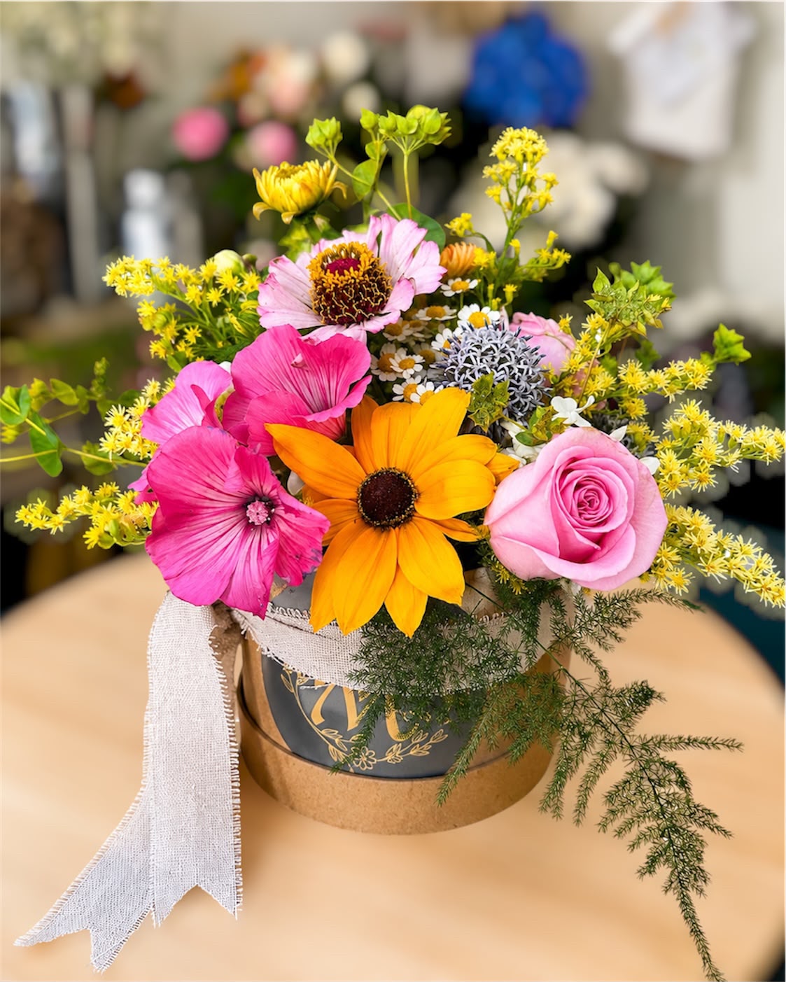 Seasonal hat box arrangement by Willow and Moss