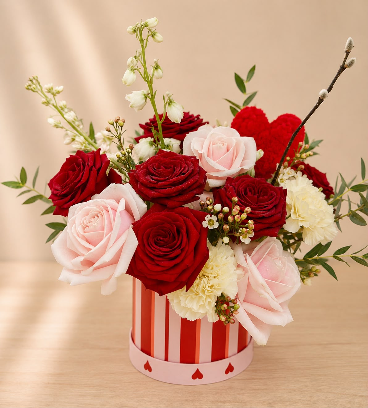 Flowers arranged in a hat box by Willow and Moss