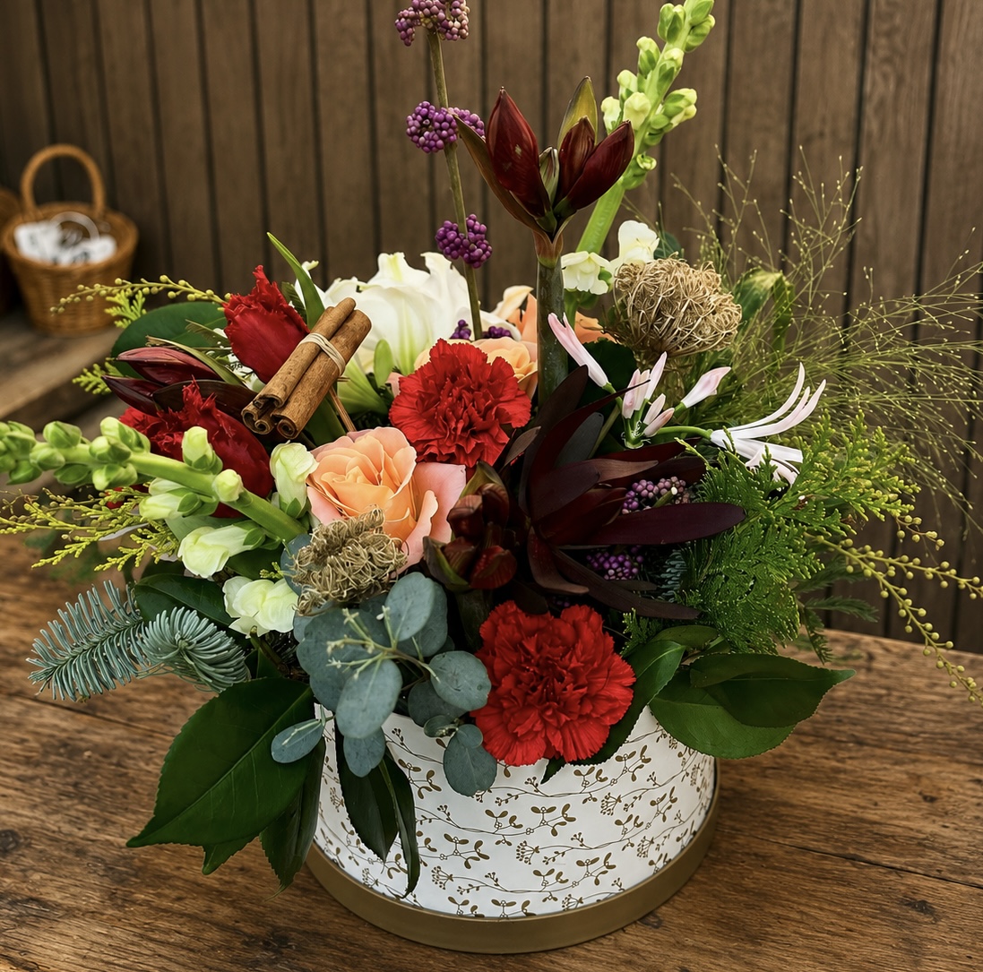 Christmas floral arrangement by Willow and Moss