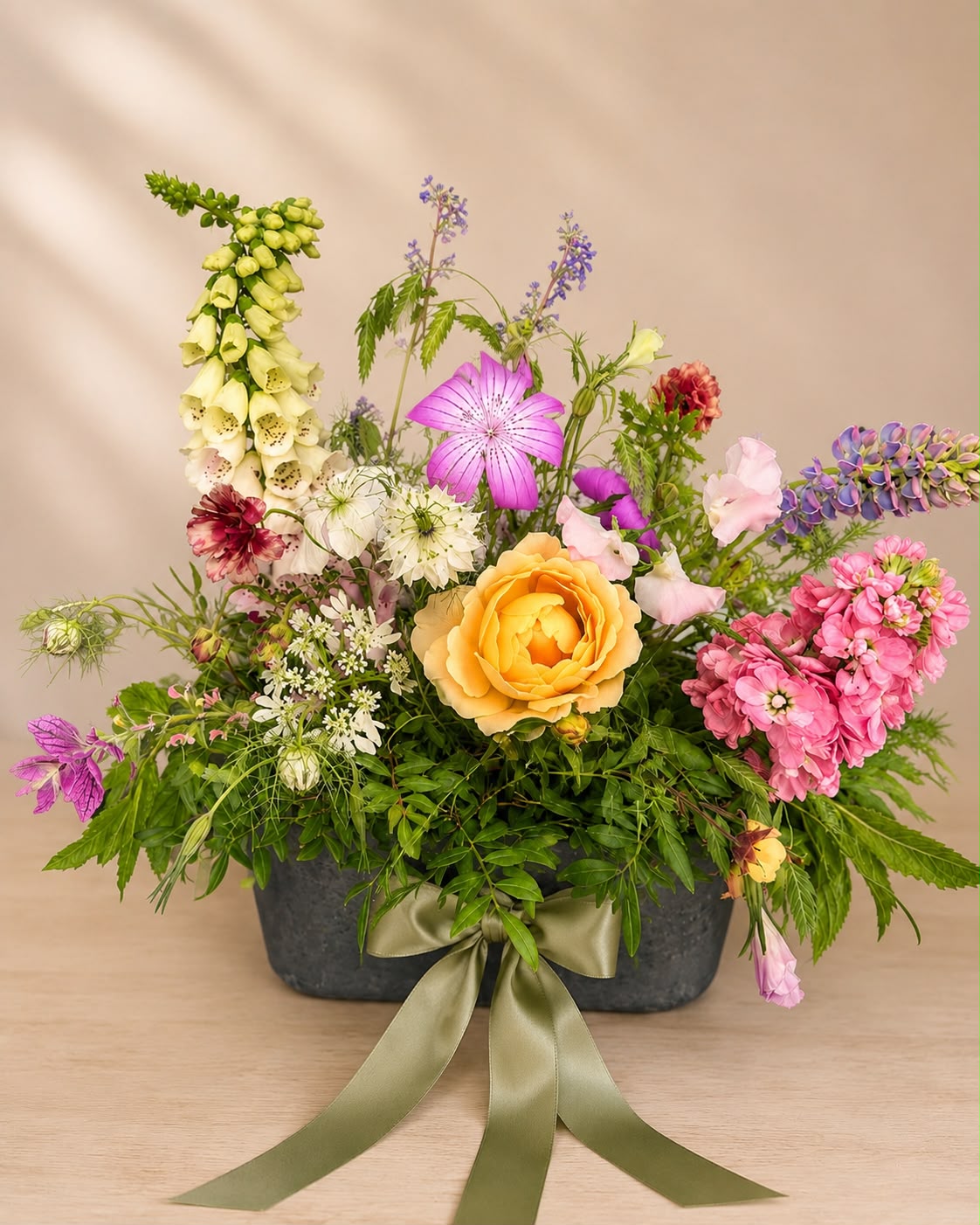 Flower basket arrangement by Willow and Moss