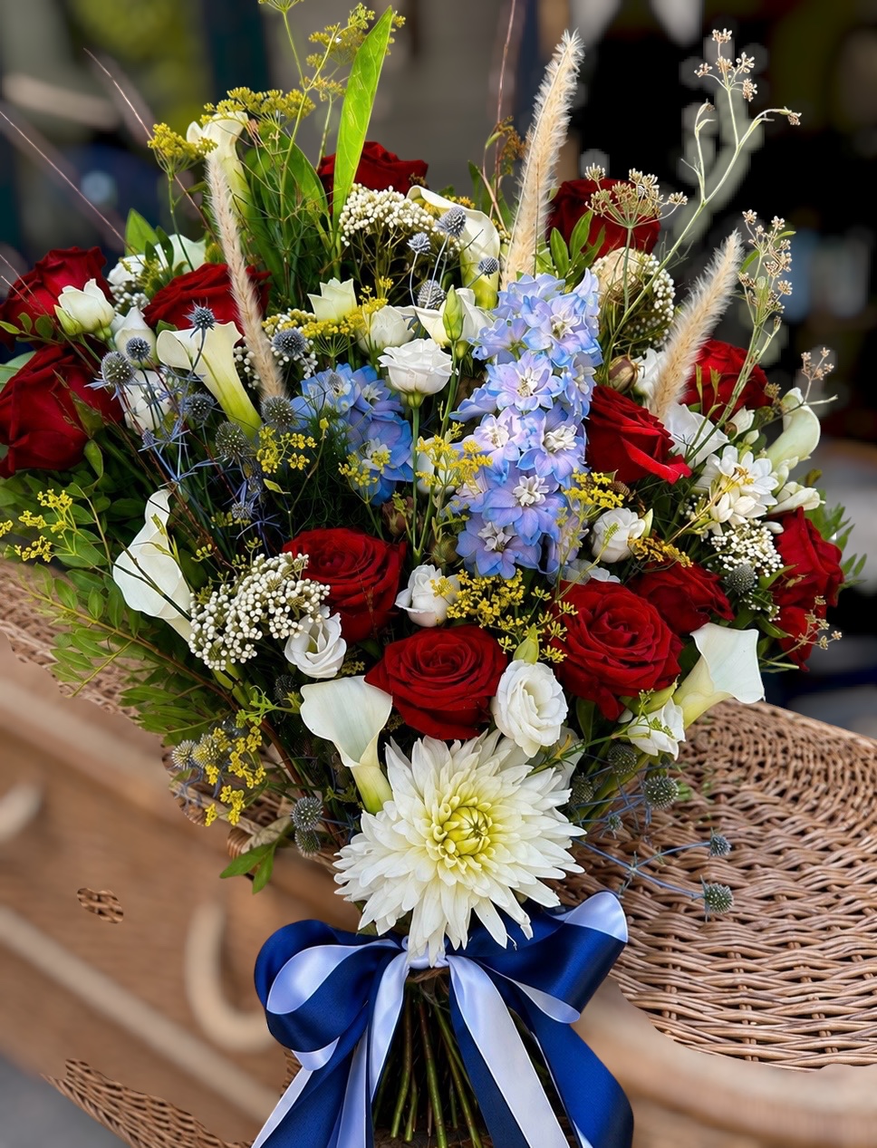 Casket flowers by Willow and Moss